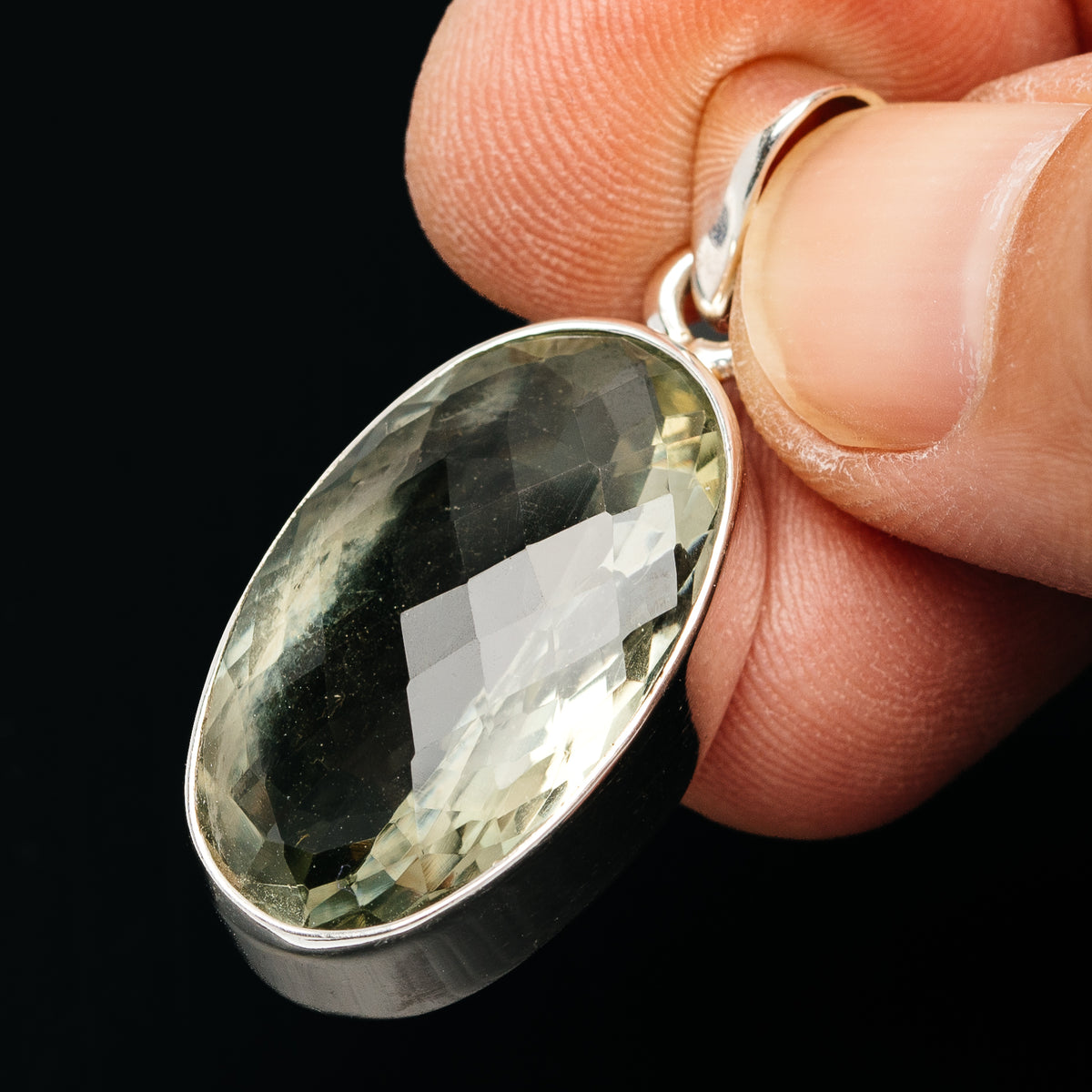 Oval faceted prasiolite gemstone pendant in .925 sterling silver, side view with loop