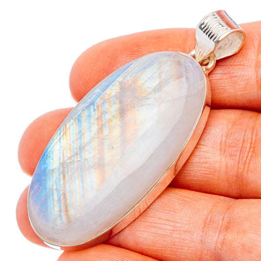 Sterling silver moonstone pendant with rainbow sheen, oval cabochon and loop bail