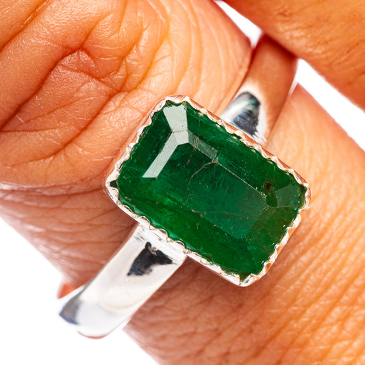 Sterling silver emerald ring on hand, cushion square faceted green stone