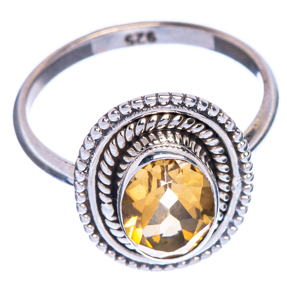 Sterling silver citrine ring, faceted oval stone; inside mark 925 visible