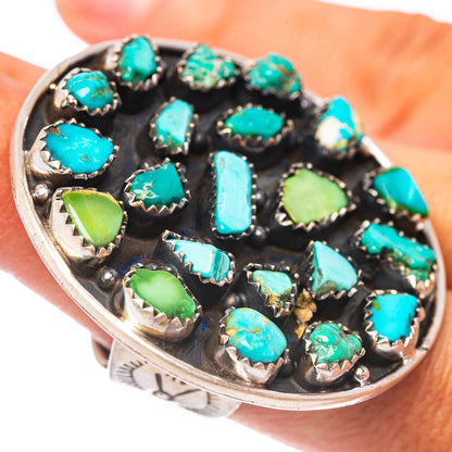 Adjustable sterling silver ring with turquoise cabochon stones, oval and round settings
