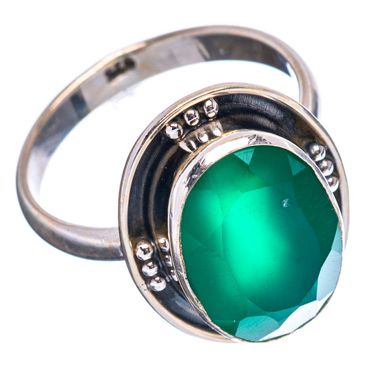 Sterling silver ring with oval green onyx, raised bezel and decorative bead setting