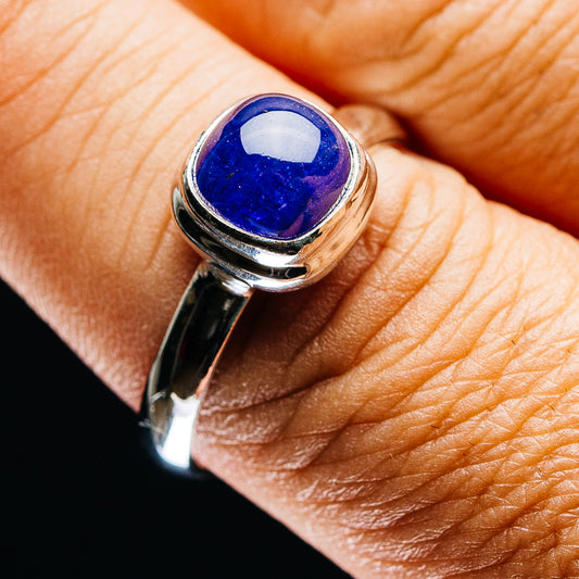 Size 10 sterling silver ring with oval blue tanzanite cabochon