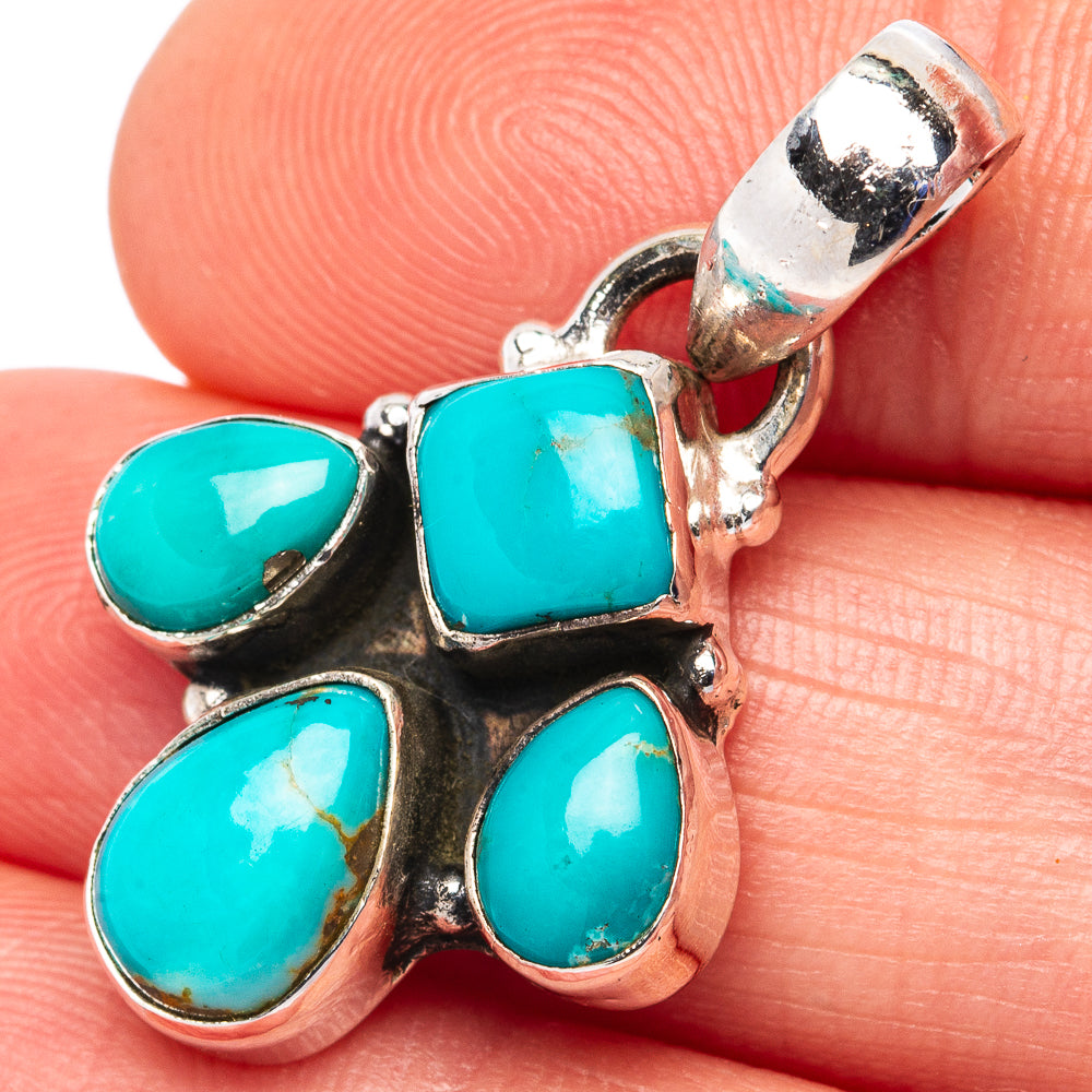 Turquoise gemstone pendant in .925 sterling silver with five teardrop and oval stones