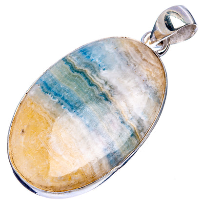 Oval blue scheelite pendant with loop bail, 925 sterling silver bezel