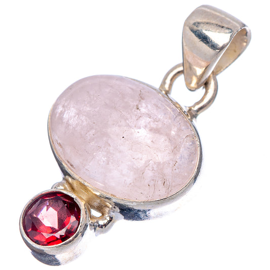 Sterling silver pendant with oval morganite stone and red round garnet, side view.