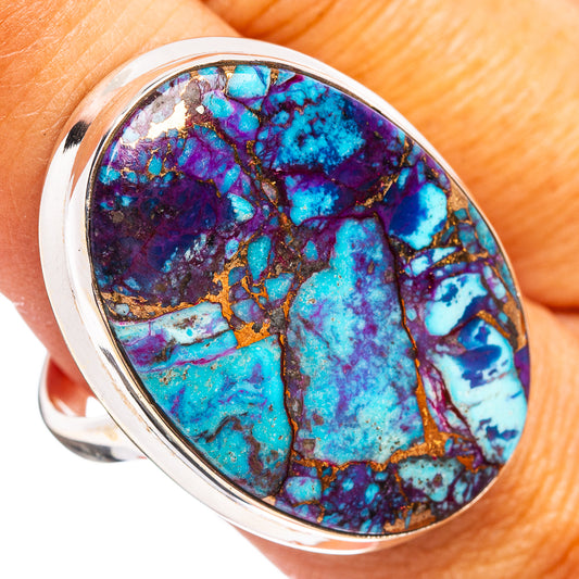 Oval turquoise gemstone ring in purple-blue with sterling silver bezel