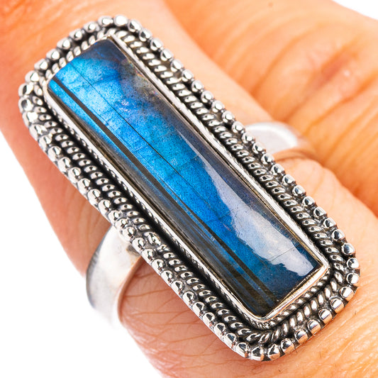 Rectangular labradorite ring with blue iridescent stone and silver beaded frame