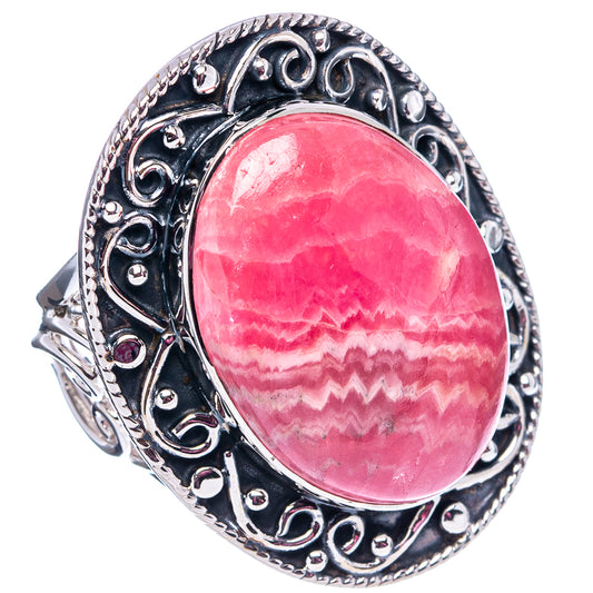 Oval pink rhodochrosite sterling silver ring with ornate filigree bezel