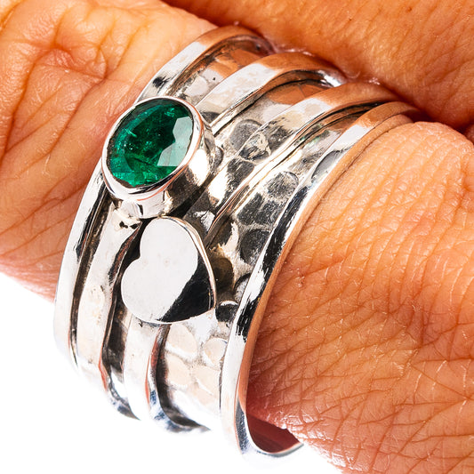 Sterling silver emerald ring with oval green gemstone and polished split shank