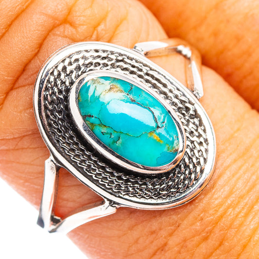 Turquoise inlay oval sterling silver ring with braided bezel detail
