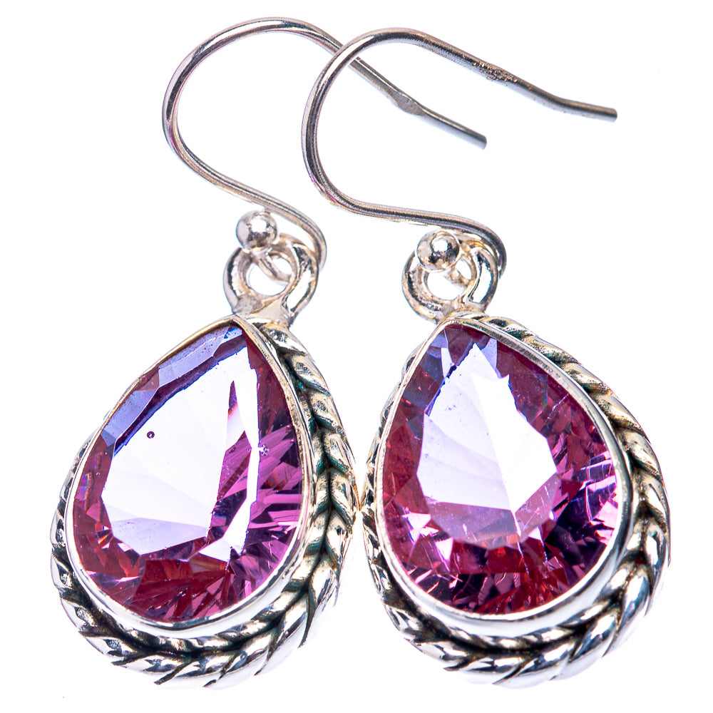 Sterling silver drop earrings with purple oval faceted color-change gemstones
