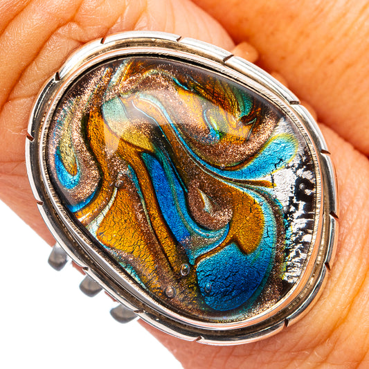 Dichroic glass ring in .925 sterling silver with oval iridescent swirl pattern