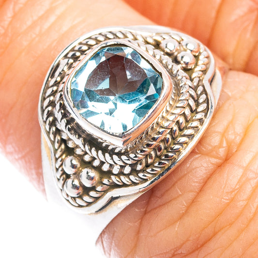 Sterling silver blue topaz ring, oval gemstone with ornate rope bezel filigree