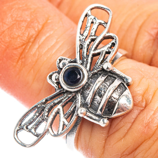Sterling silver bee dainty ring with dark blue round gemstone centerpiece