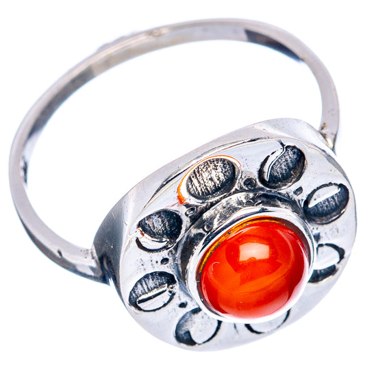 Sterling silver dainty ring with red-orange oval carnelian and decorative side engravings