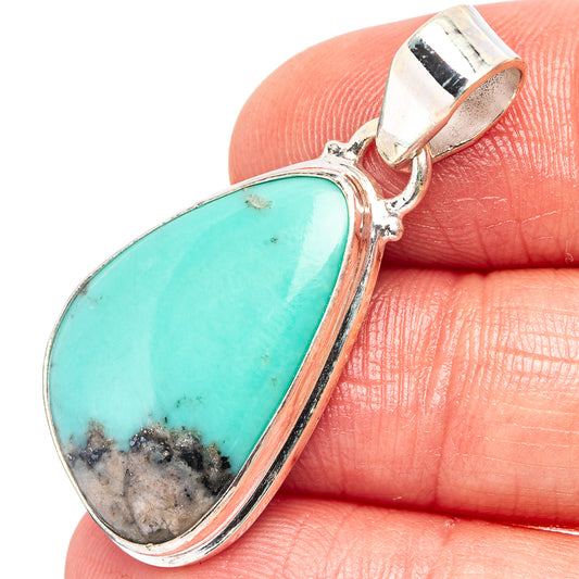 Sterling silver turquoise teardrop pendant with top bail, stone bezel details