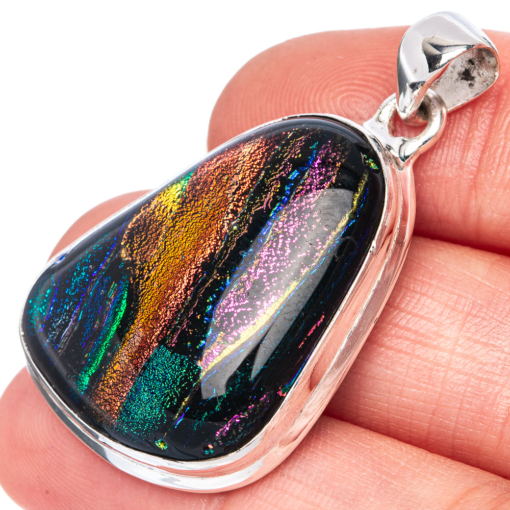 Dichroic glass oval pendant in rainbow iridescence, sterling silver bail and bezel