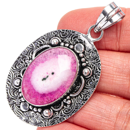 Pink solar quartz pendant with oval bezel in ornate German silver setting