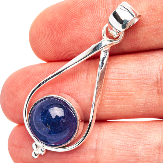 Sterling silver teardrop pendant with deep blue tanzanite gemstone cabochon