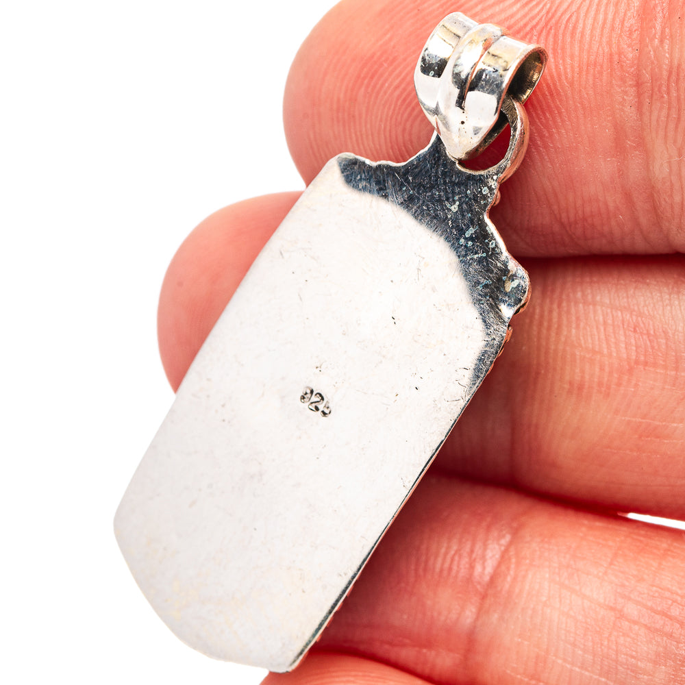 Sterling silver pendant back with stamped markings and bail loop