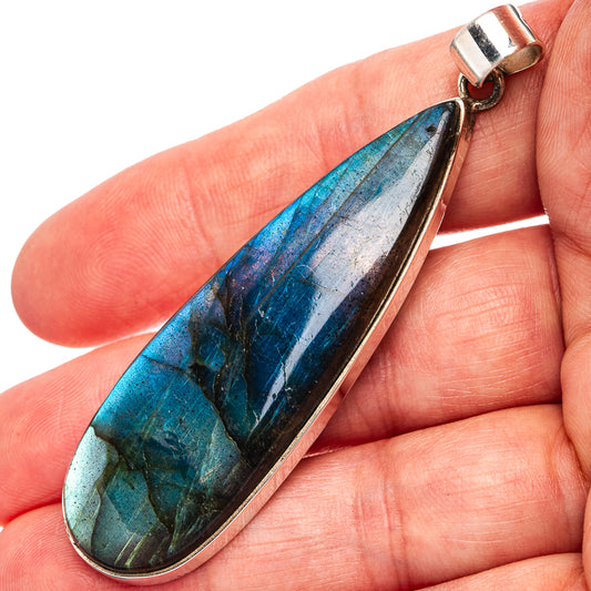Labradorite teardrop pendant in .925 sterling silver bezel, blue-green iridescent stone