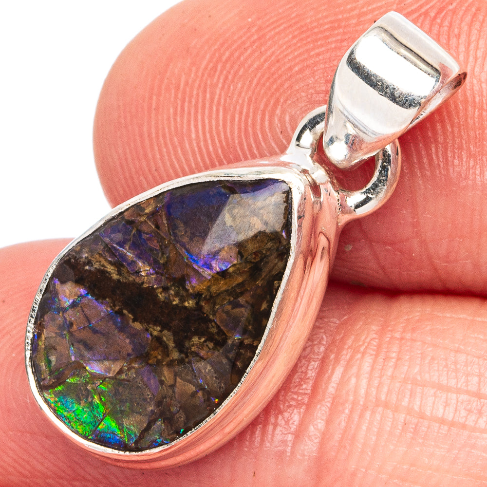 Teardrop ammolite pendant in sterling silver with iridescent blue-green flashes