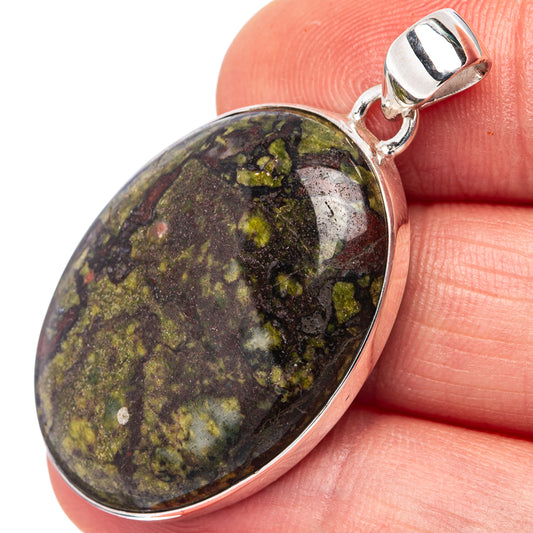 Oval sterling silver pendant with dark jasper cabochon, green and yellow speckles