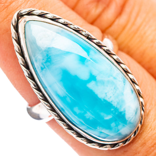 Larimar gemstone ring with oval blue stone in twisted sterling silver bezel