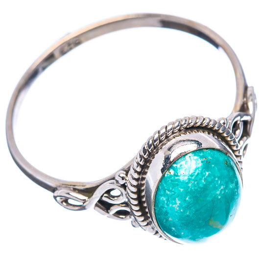 Sterling silver ring with turquoise oval gemstone and braided bezel, side view