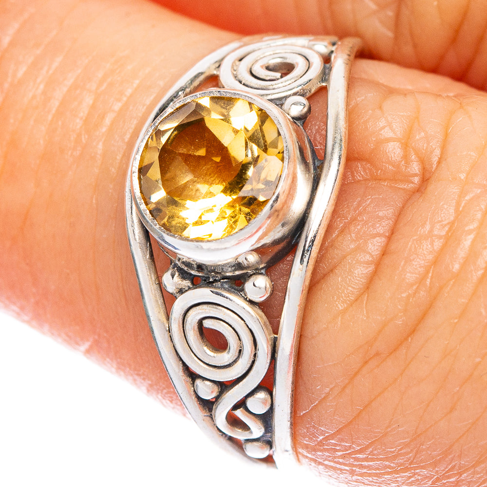 Sterling silver dainty ring with faceted yellow citrine stone and swirl filigree
