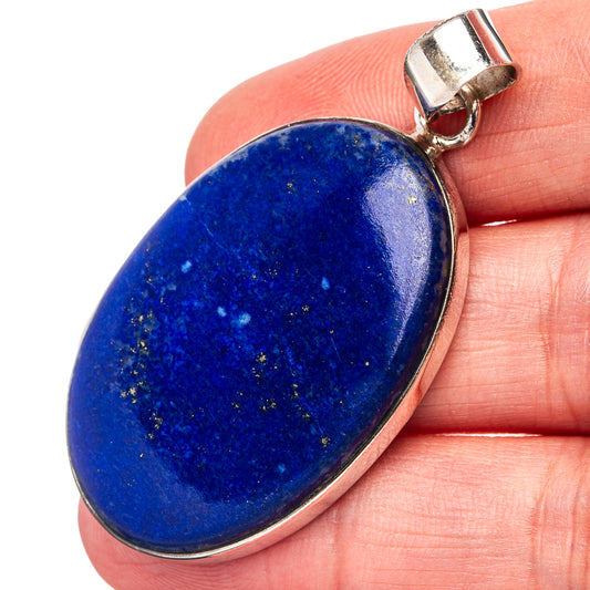 Lapis lazuli teardrop pendant in .925 sterling silver with loop bail