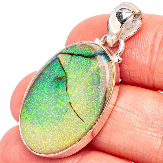 Sterling silver opal pendant with oval iridescent green and yellow stone