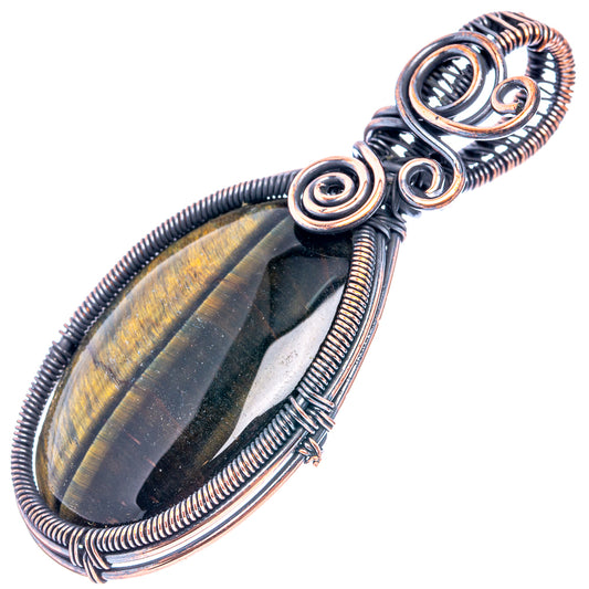 Oxidized copper wire-wrapped tiger's eye pendant with open spiral frame