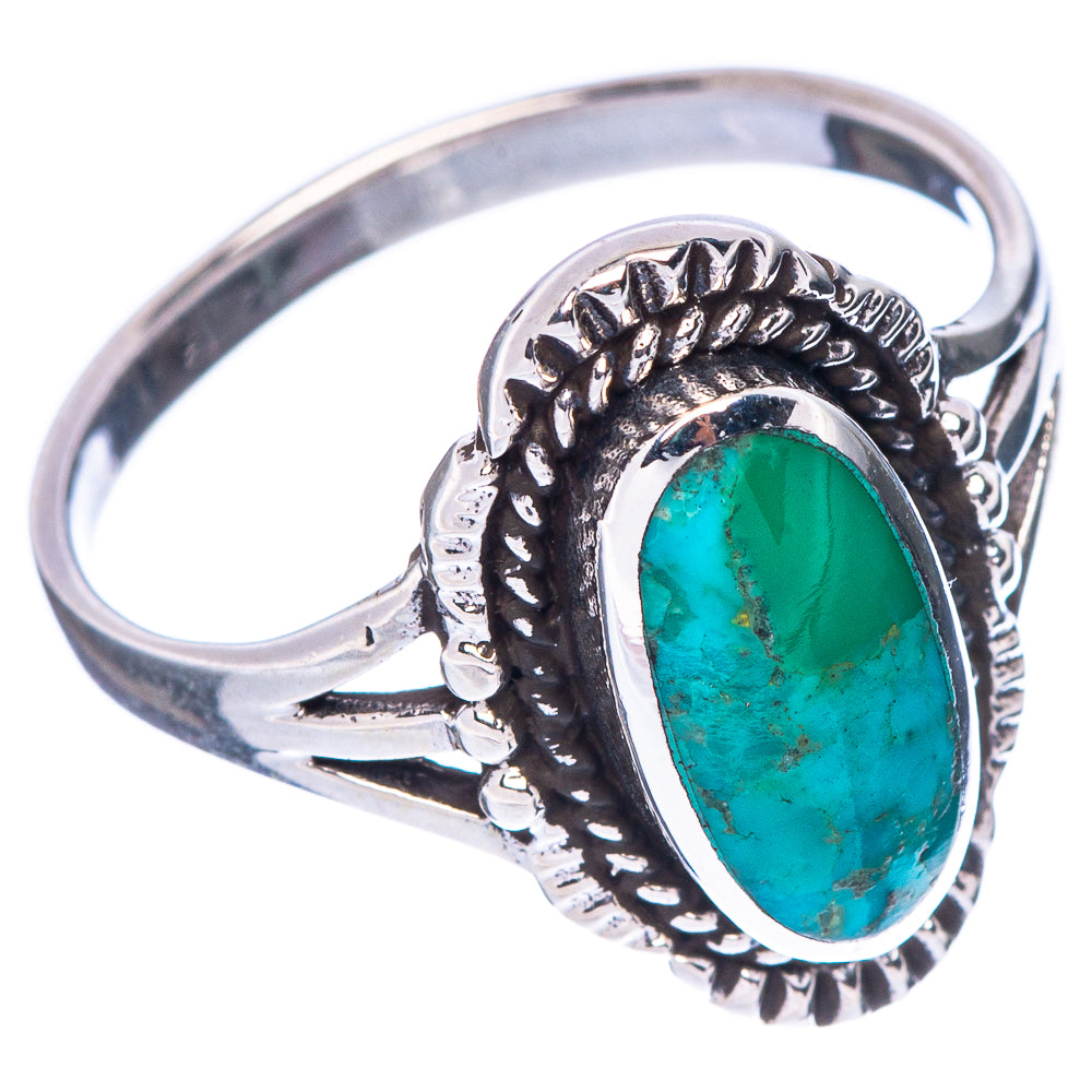 Oval turquoise cabochon sterling silver ring, side view with decorative leaf-like border