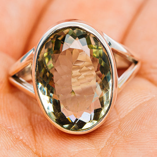Oval green amethyst ring, .925 sterling silver band, angled view with faceted stone