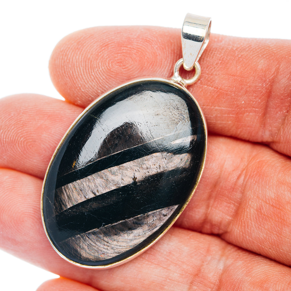 Oval hypersthene pendant in .925 sterling silver with polished loop bail