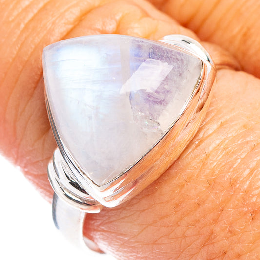 Sterling silver ring with pear-shaped rainbow moonstone cabochon