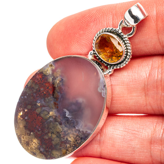 Oval plume agate pendant with amber citrine in ornate .925 sterling silver bezel