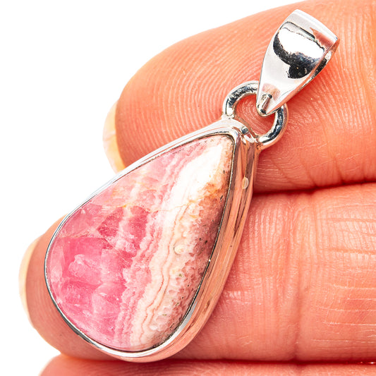 Rhodochrosite teardrop pendant in .925 sterling silver, pink stone with silver frame.