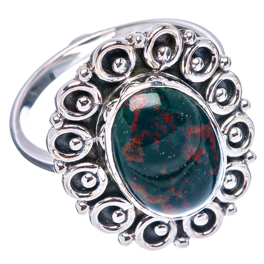 Sterling silver statement ring with oval dark green red speckled cabochon and halo setting