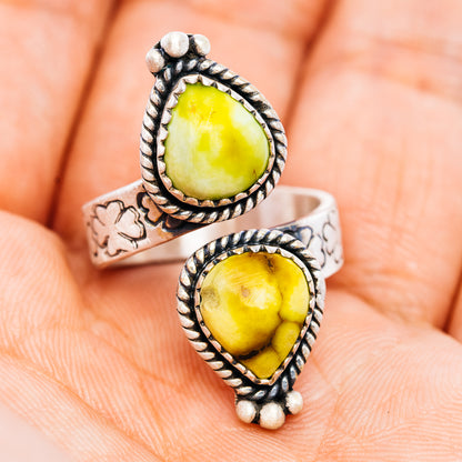 Sterling silver ring with large yellow teardrop stone and twisted rope bezel