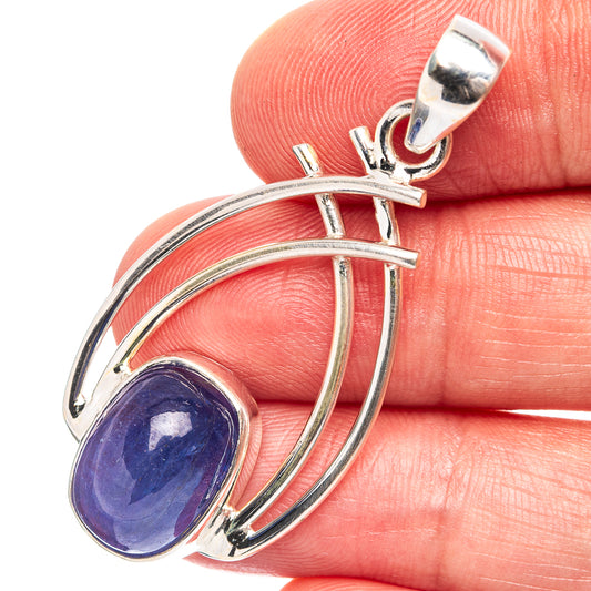 Sterling silver tanzanite pendant with oval blue gemstone and curved arch setting
