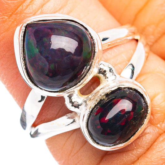 Sterling silver double opal ring with two oval black opal gemstones, iridescent