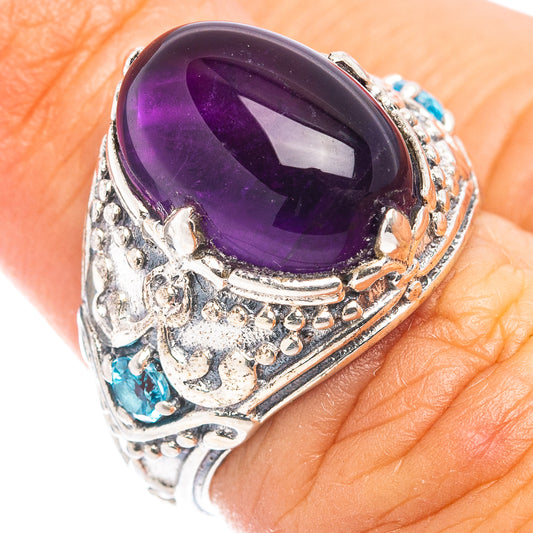 Sterling silver amethyst ring with large purple oval stone, ornate blue accent details