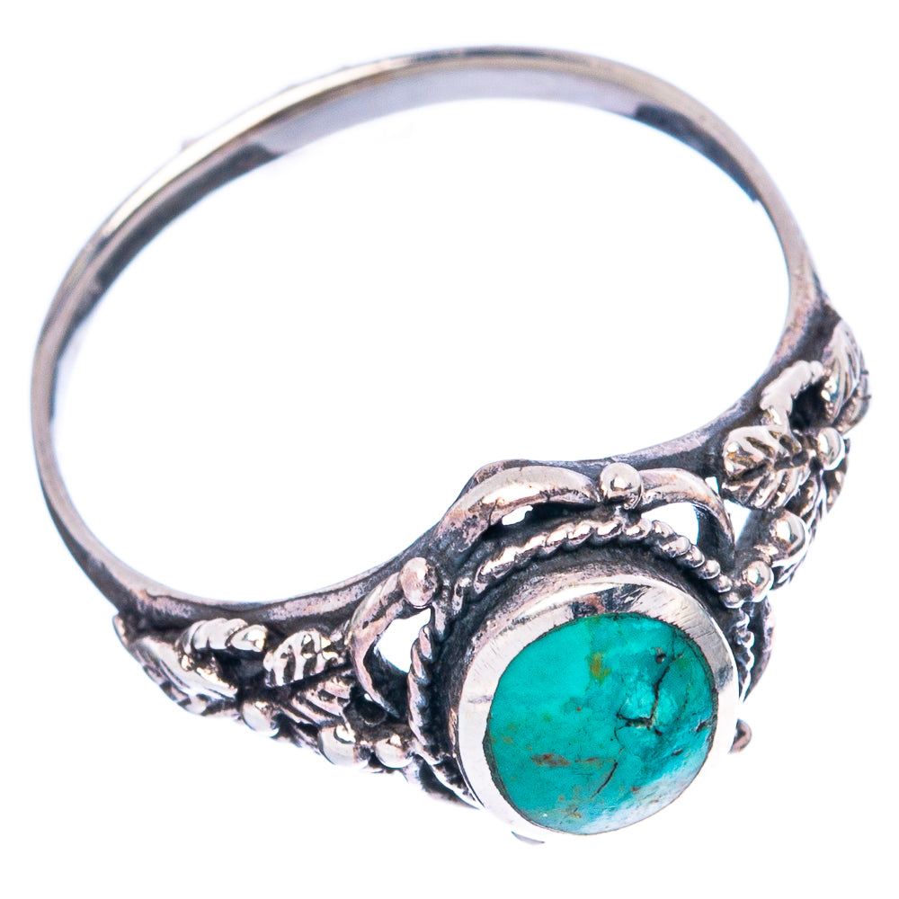 Sterling silver ring featuring round turquoise stone and detailed braided-style shank, size 8.75