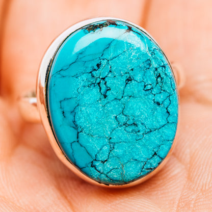 Turquoise oval cabochon ring with sterling silver band, detailed front view