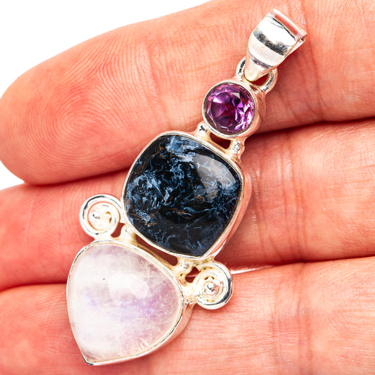 925 sterling silver pendant with oval dark blue and oval pale pink cabochons, plus purple round stone