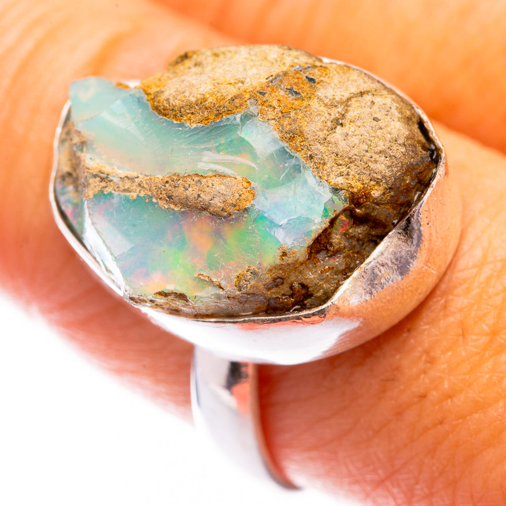 Rough Ethiopian opal ring with oval stone in 925 sterling silver bezel setting