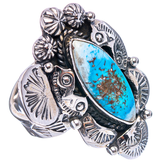 Adjustable sterling silver ring with oval turquoise stone and ornate stamped setting